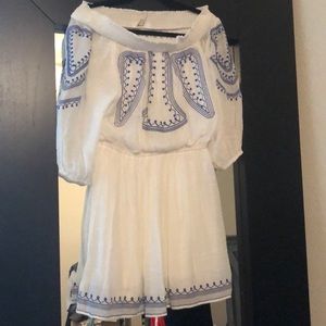 White off the shoulder dress with blue embroidery